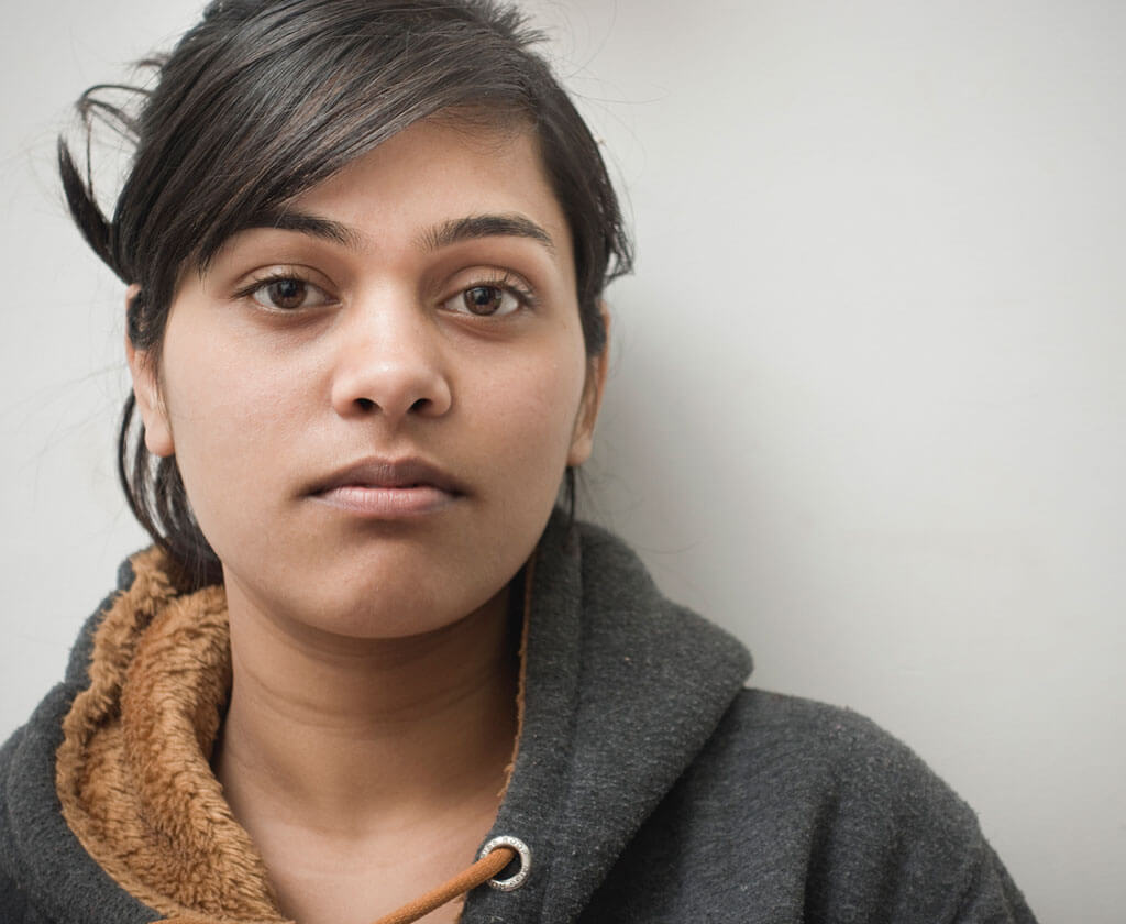 a woman with brown eyes